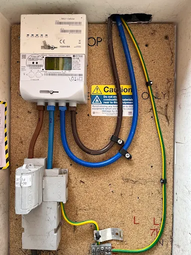 Meter board with new tails and earthing installed